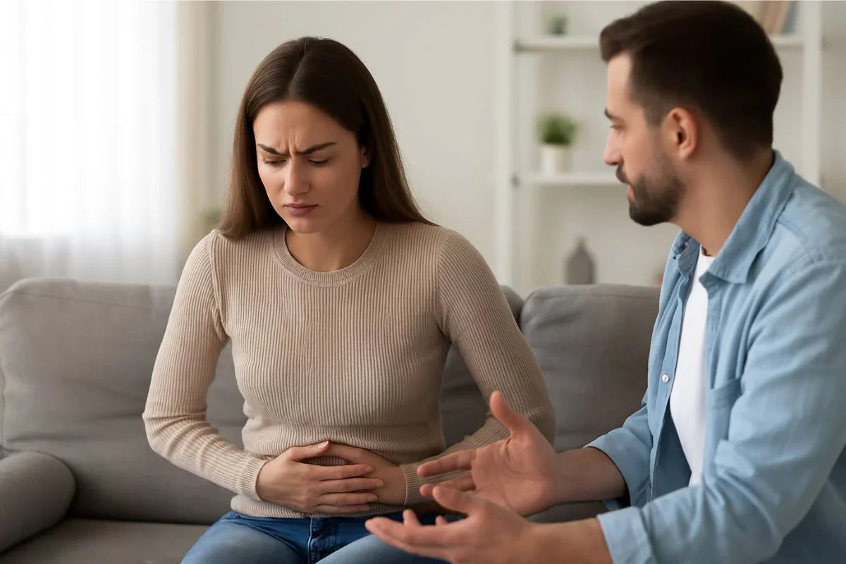 Vrouw met handen op haar buik
