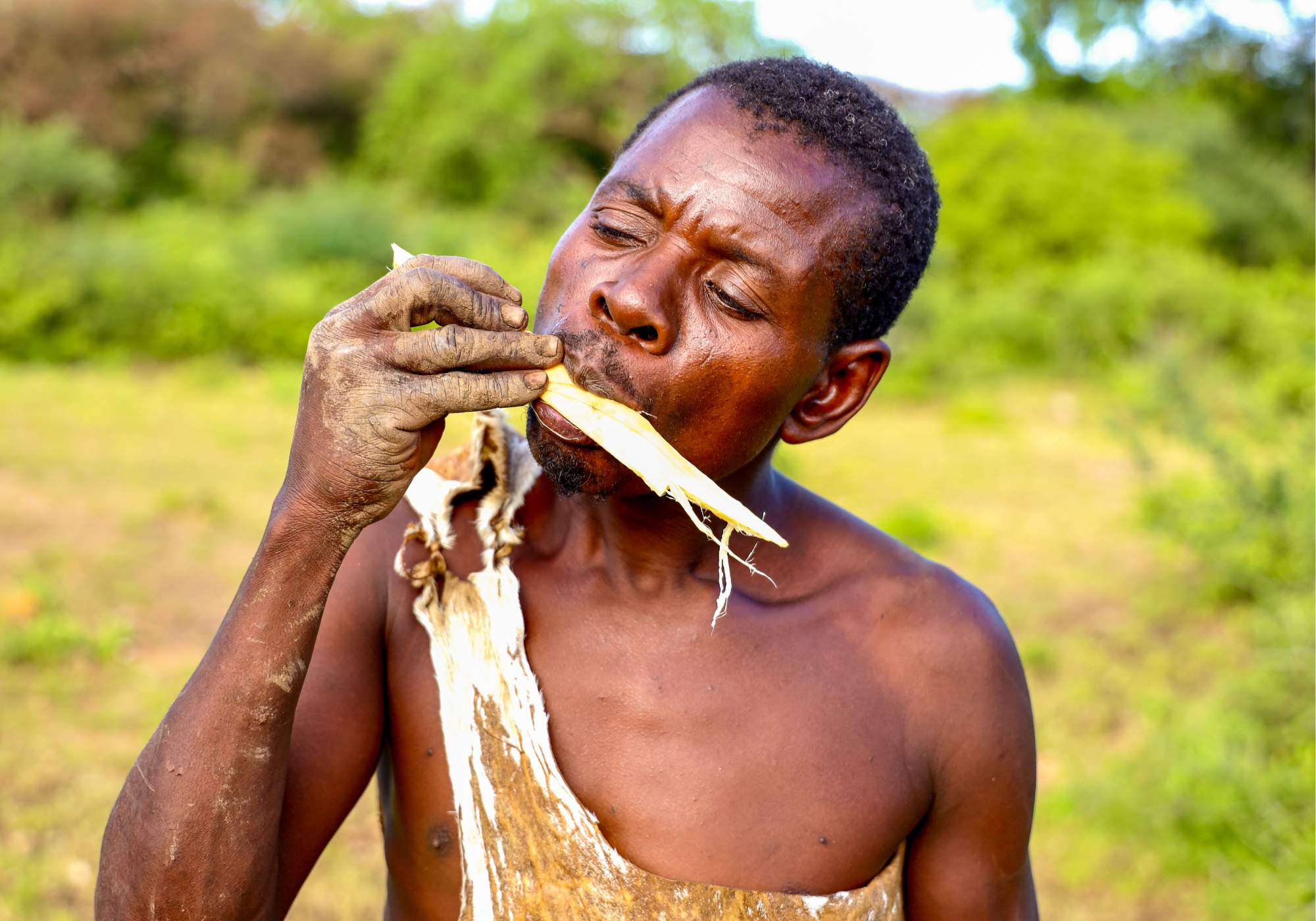 Indigenous man eating organic food